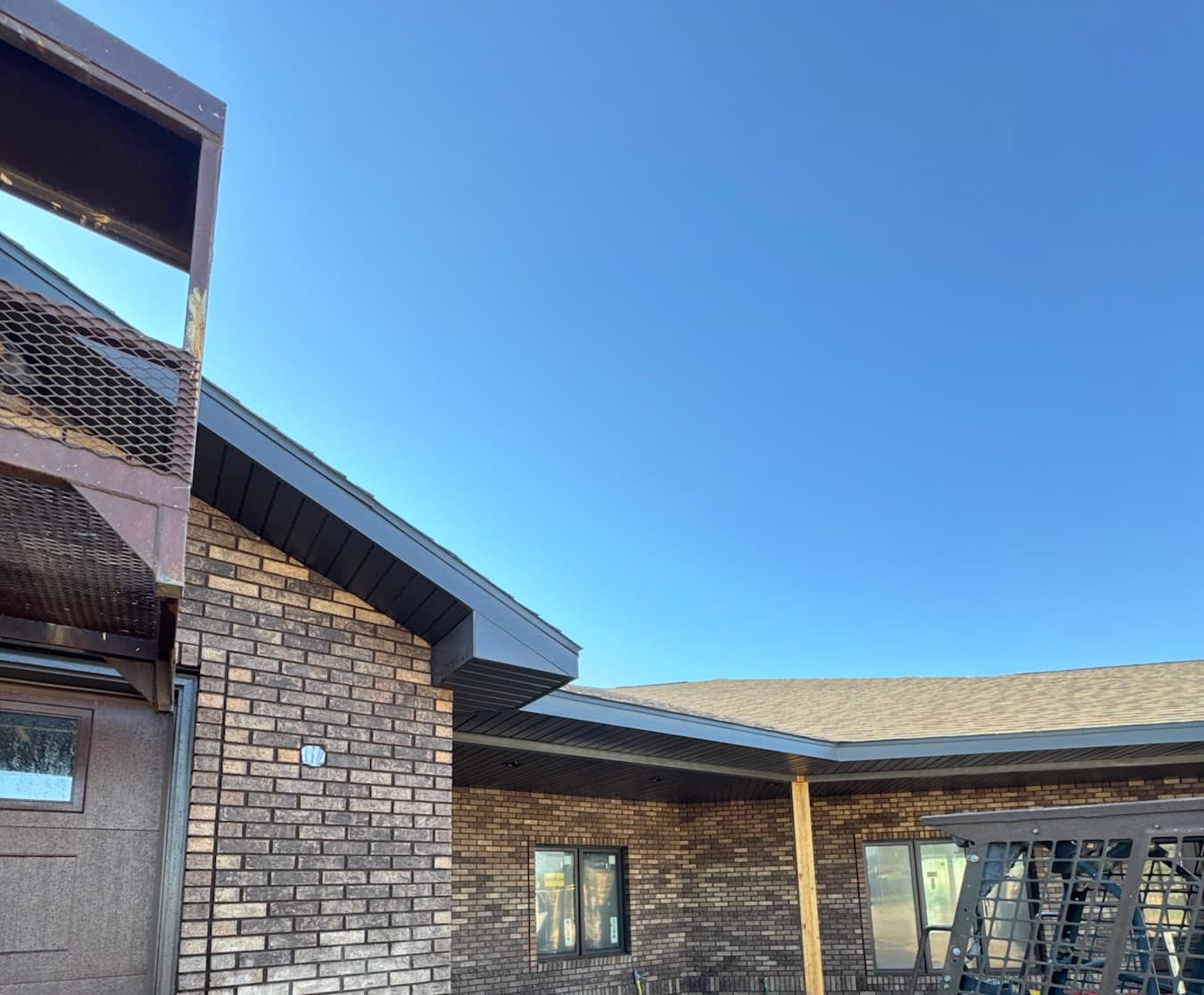 Brick home with attached garage under construction