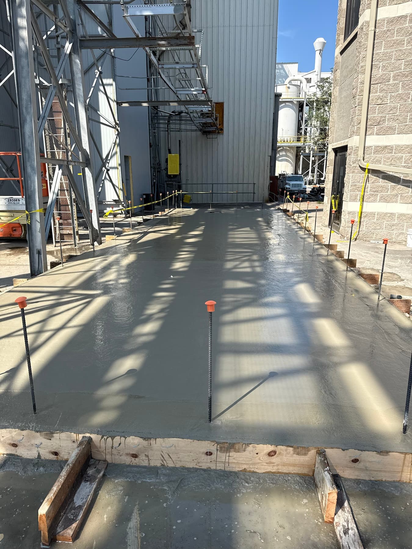 Fresh commercial concrete slab poured by Gali Masonry